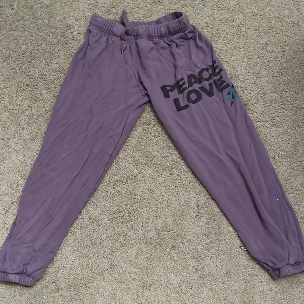 Purple followers by zoe sweatpants. Kids size large.